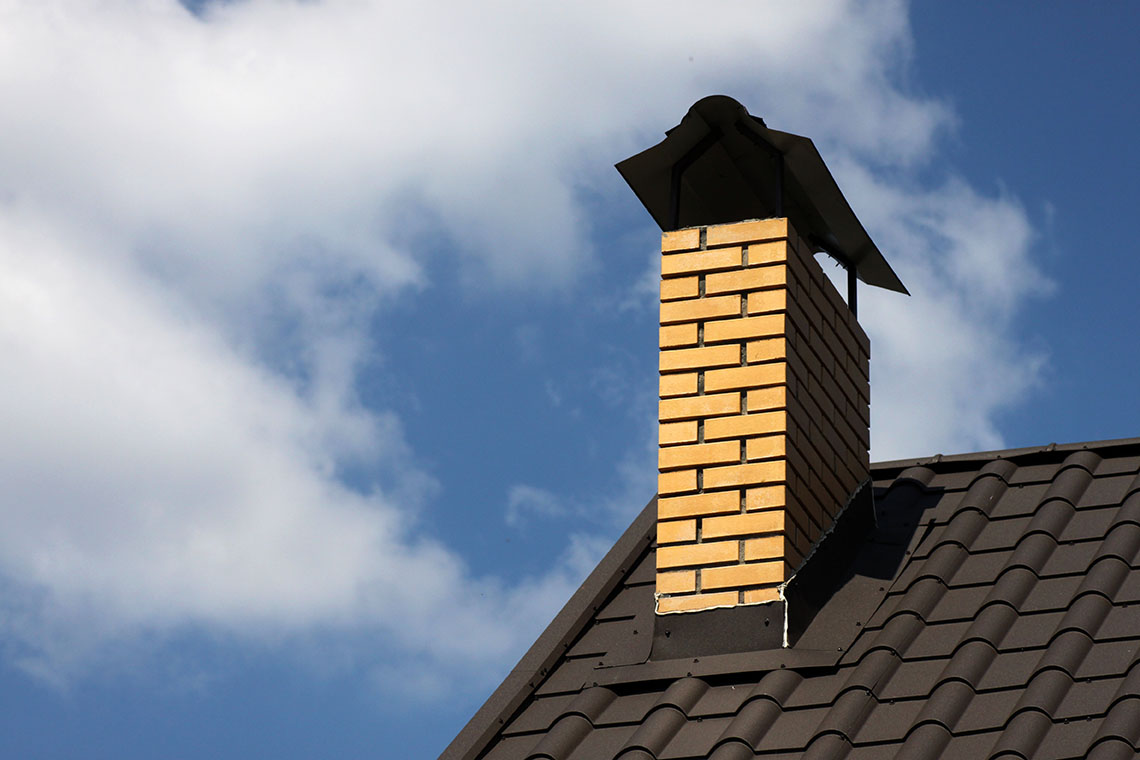 chimney on a roof of the house